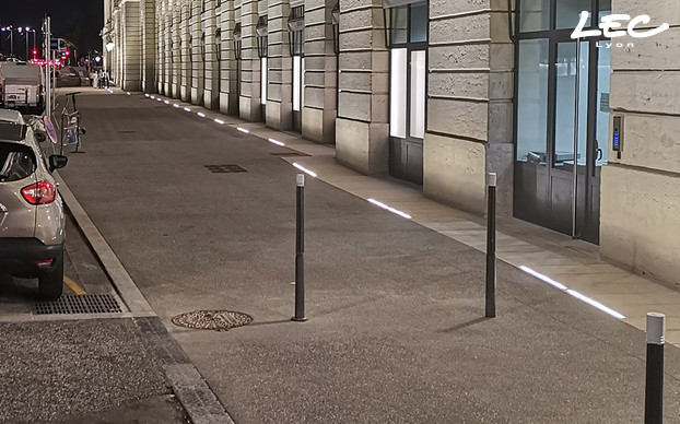 <p>LEC 5760 Passy spotlights are recessed into the ground, in the pavement. These are flush with the ground and are equipped with barn doors so as not to dazzle pedestrians. These spotlights are equipped with customised optics, based on their distance from the wall, in order to obtain uniform lighting along the entire façade, despite the spotlights not being installed in a continuous line. These spotlights are focused on lighting the first level of the façade. LEC 4660 Corsica spotlights take over on the upper level.</p>
